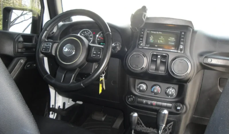 
								2014 Jeep Wrangler Sport S full									